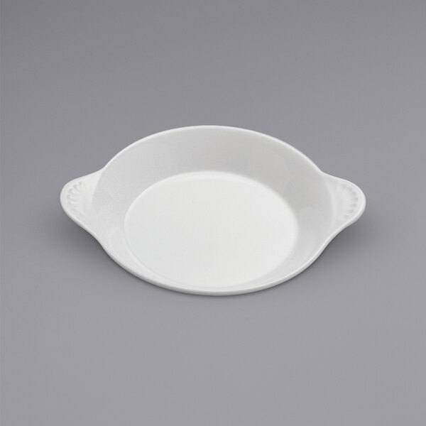A white round dish with handles.