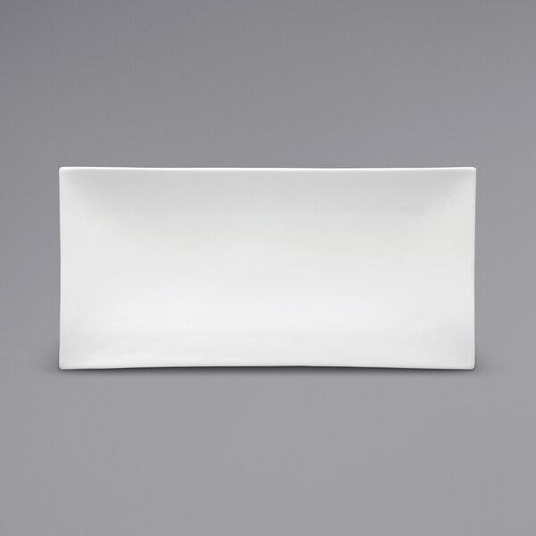 A white rectangular porcelain sushi platter with a rolled edge.