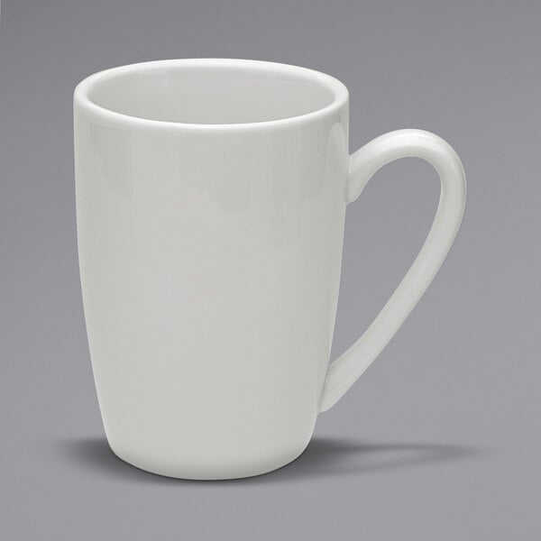 A close-up of a white Oneida Buffalo porcelain European mug with a handle.