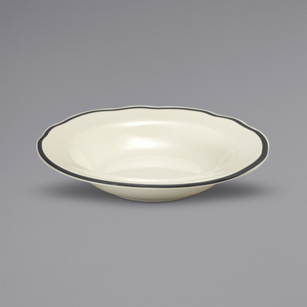 A white Oneida Buffalo china bowl with black trim.