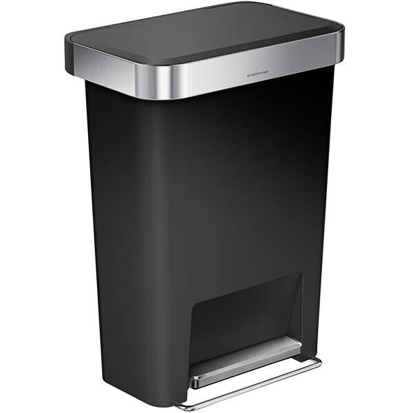 A black simplehuman rectangular front step-on trash can with a silver handle.