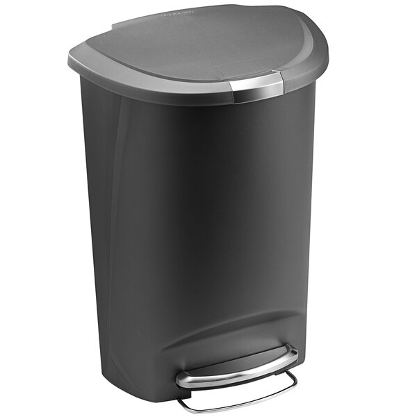 A simplehuman gray semi-round step-on trash can with a lid.