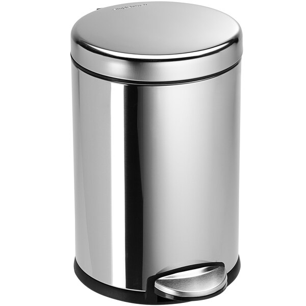 A simplehuman polished stainless steel round step-on trash can with a black lid.