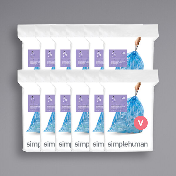 A group of six blue and white packages of simplehuman Code V custom fit recycling liners.