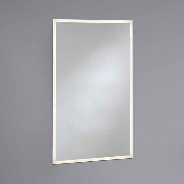 A white rectangular Bobrick LED backlit mirror.