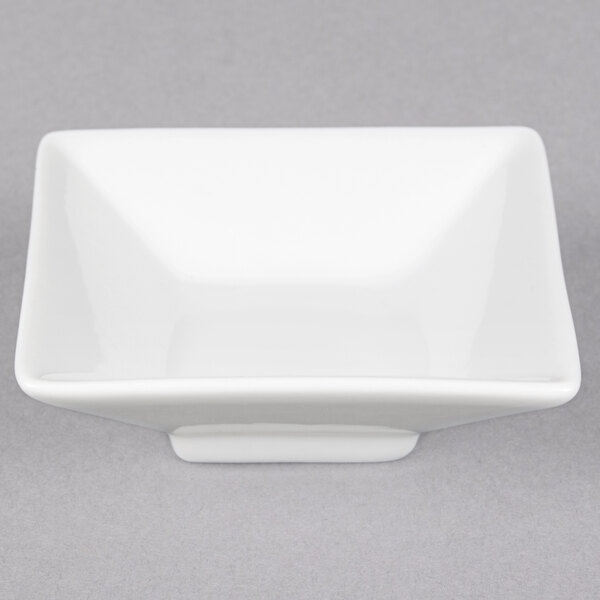 A CAC Citysquare bright white square porcelain bowl.