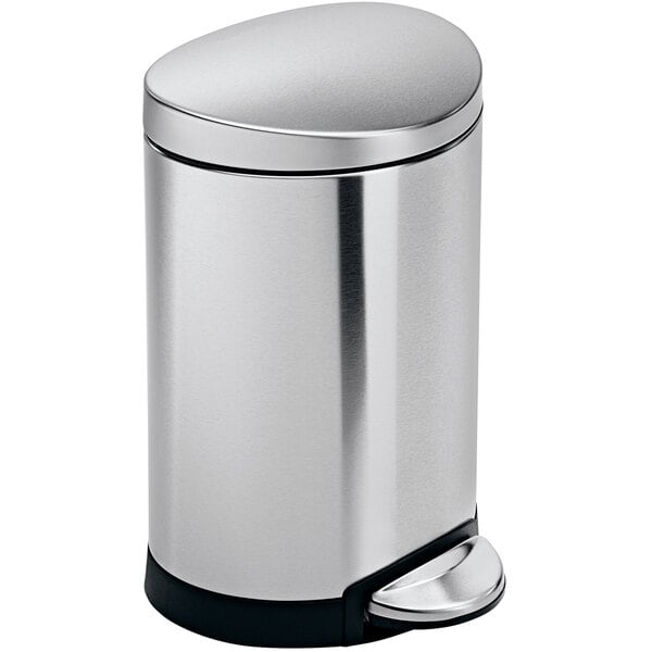 A stainless steel simplehuman semi-round step-on trash can with a black lid.