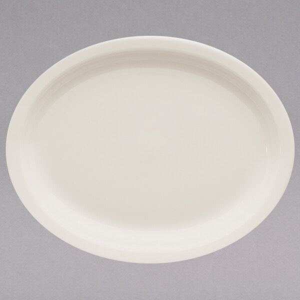 A white Homer Laughlin oval china platter with a narrow white rim.