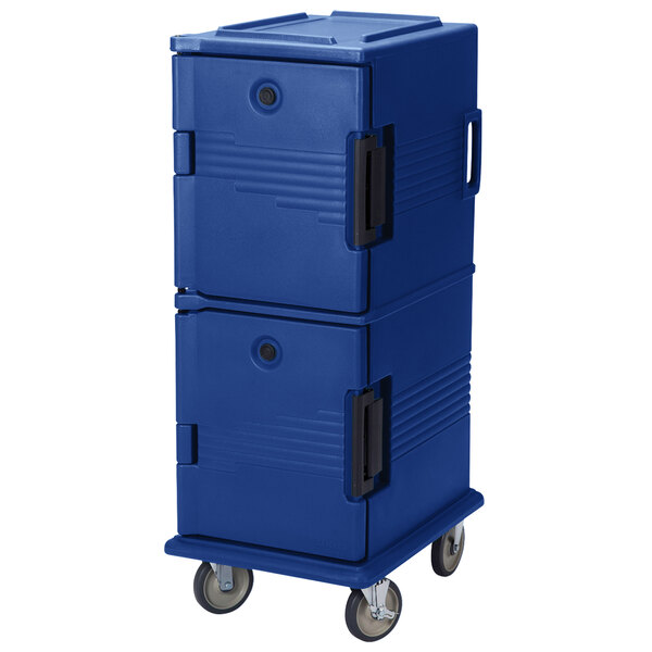 A navy blue Cambro food pan carrier on wheels with a door.