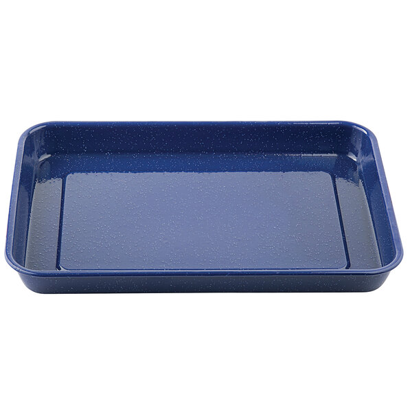 A blue rectangular Tablecraft enamelware tray with small specks on a counter.