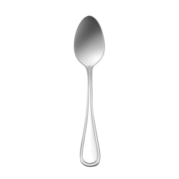 A close-up of a Oneida New Rim stainless steel teaspoon with a white background.