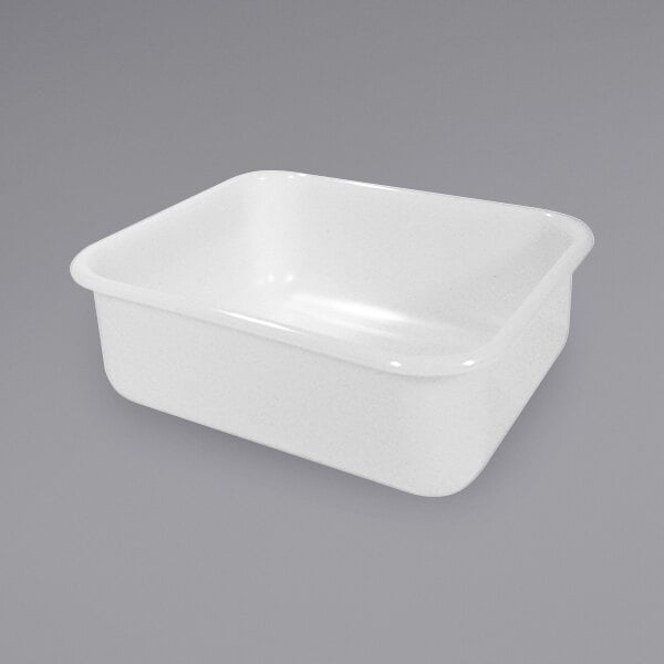 A white plastic container on a gray background.