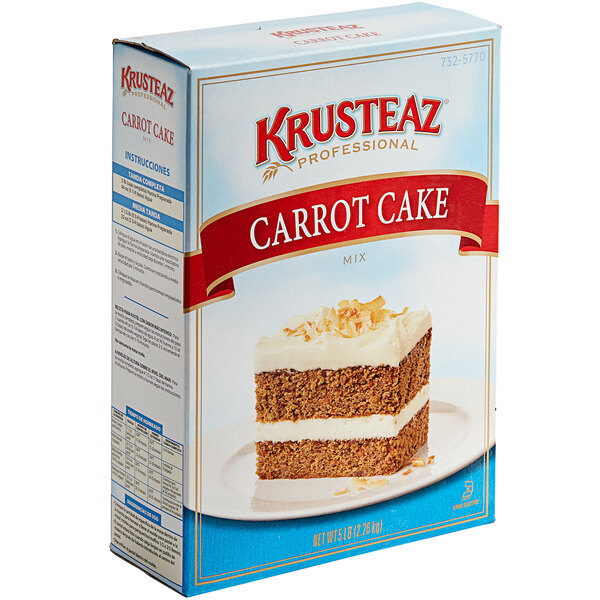 A white and blue box of Krusteaz Professional Carrot Cake Mix.