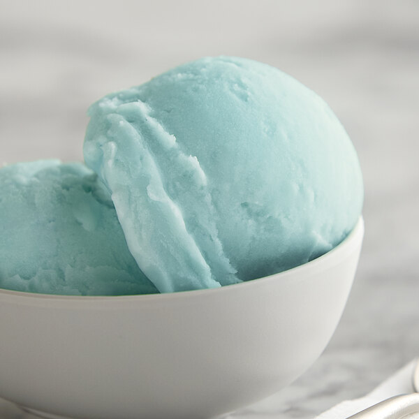 A bowl of blue I. Rice cotton candy water ice.