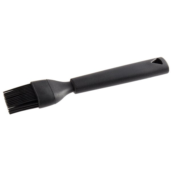 A black silicone bristle pastry brush with a handle.