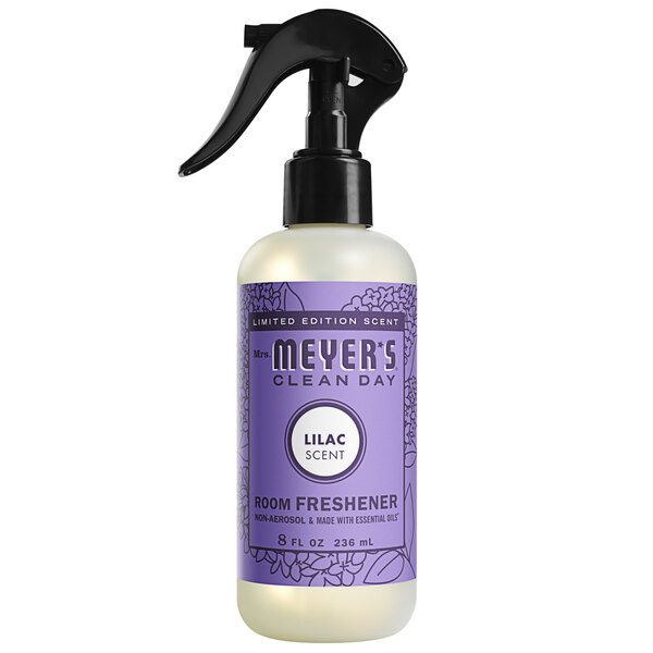 A spray bottle of Mrs. Meyer's Clean Day Lilac Air Freshener with a purple label.