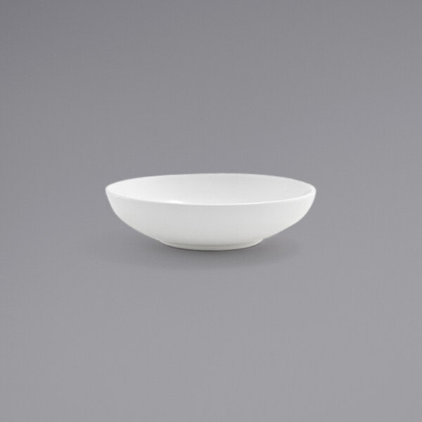 A Front of the House Harmony bright white low round porcelain bowl.