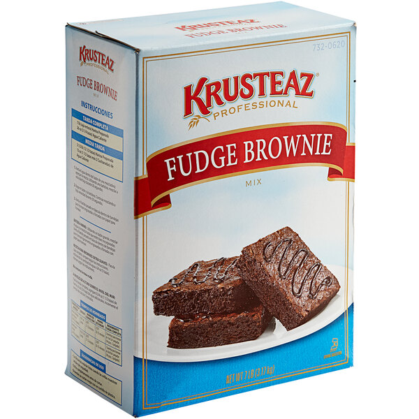 A box of Krusteaz Professional Fudge Brownie Mix on a kitchen counter.