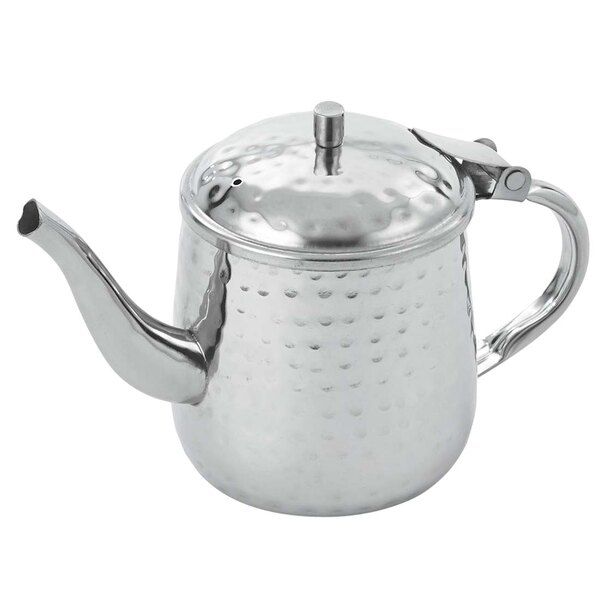 A silver stainless steel teapot with a lid and handle.