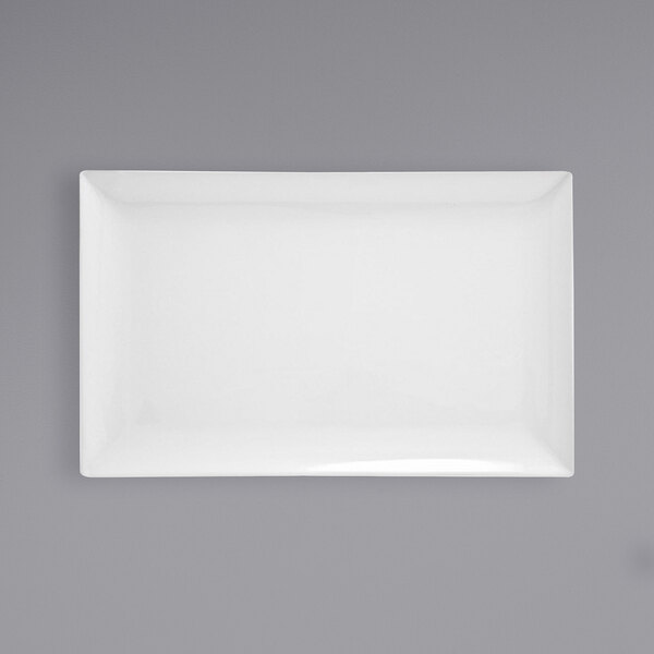 A white rectangular porcelain platter with a gray border.