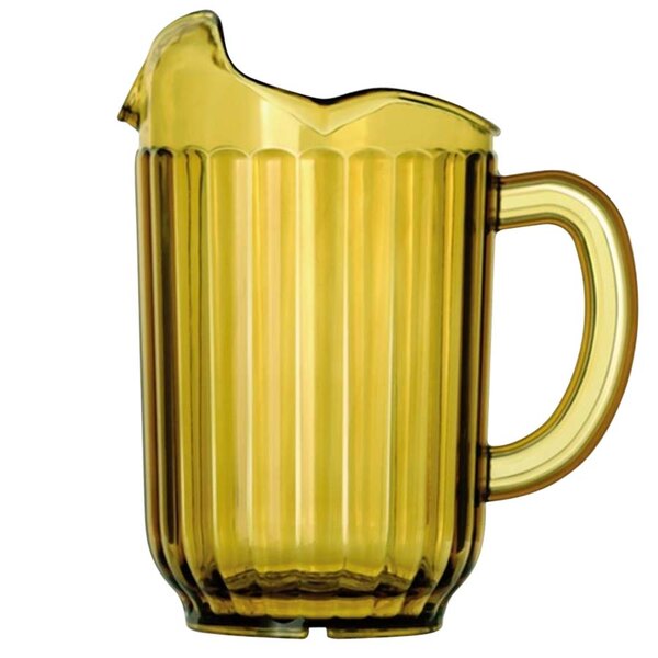 A yellow plastic Vollrath Traex pitcher with a handle.
