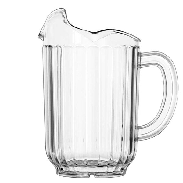A clear plastic Vollrath Traex pitcher with a handle.