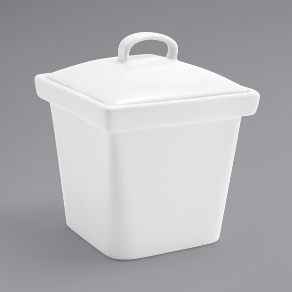 A white square porcelain pot with a lid.