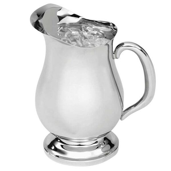 A Vollrath stainless steel water pitcher with ice inside.