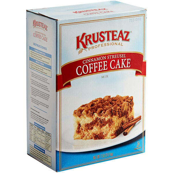 A box of Krusteaz Professional Cinnamon Streusel Coffee Cake Mix with a piece of cinnamon coffee cake.