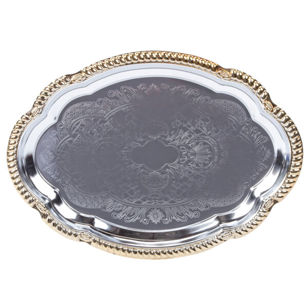 A silver tray with gold trim.