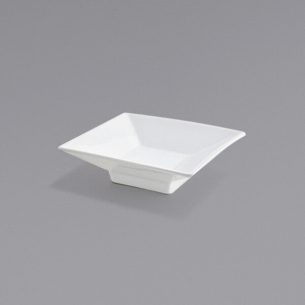 A Front of the House Kyoto bright white square porcelain sauce dish.