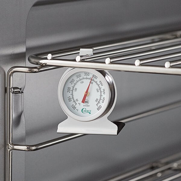 A Choice 2" Dial Oven Thermometer on a rack.