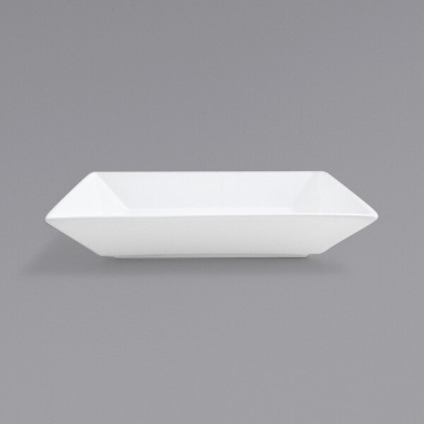 A bright white square porcelain bowl with a black border on a white background.