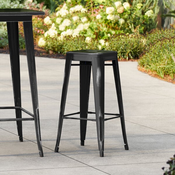 Lancaster Table & Seating Alloy Series Distressed Black Outdoor Backless Barstool