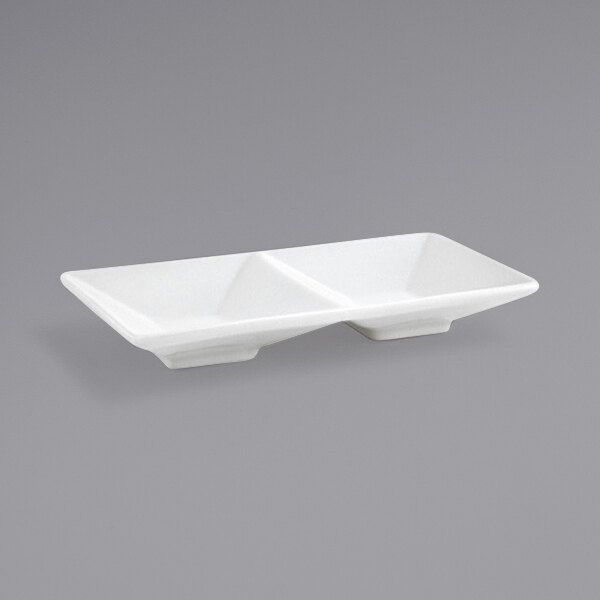 Two white rectangular porcelain sauce dishes with two compartments.