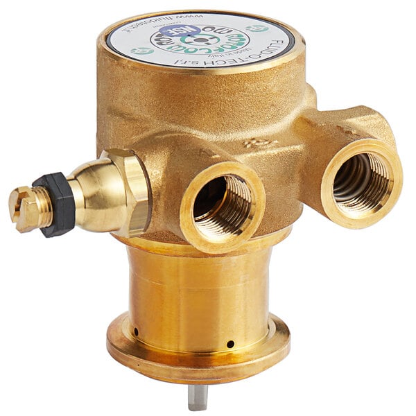 A gold metal Estella Caffe boiler pump with two brass valves and a round cap.