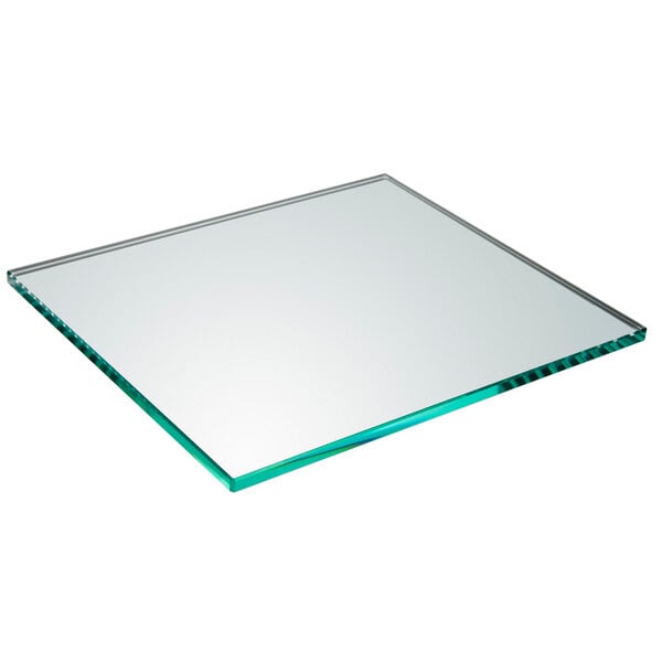 A square smoked glass shelf with a green edge.