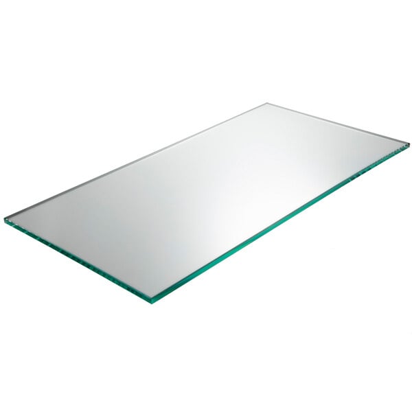 A rectangular smoked glass shelf with green edges.