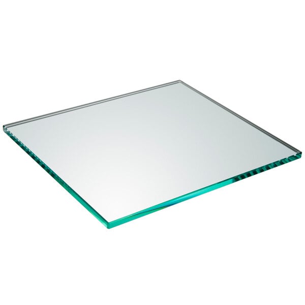 A smoked glass square shelf with a green border.