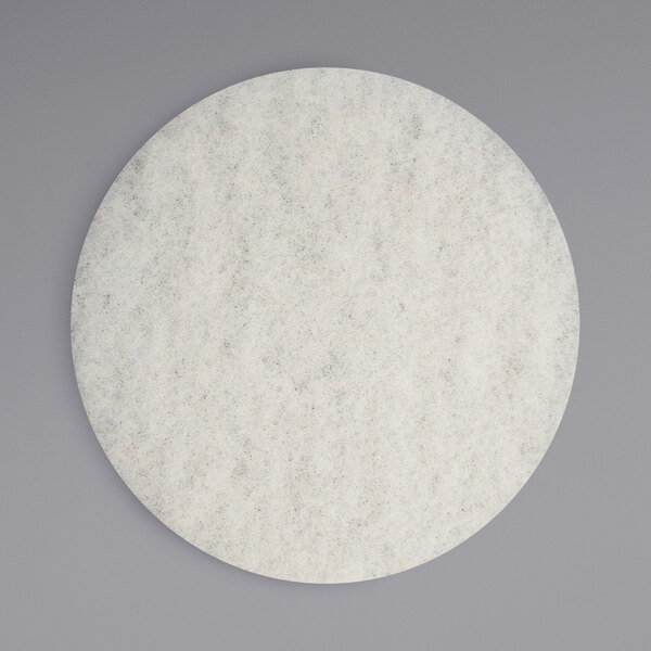 A white round paper pad.