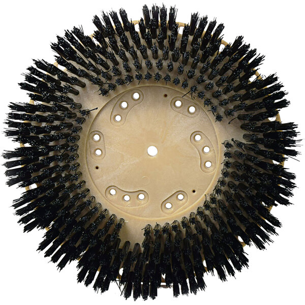 A circular Bissell Commercial black nylon floor scrubbing brush with many holes and black bristles.