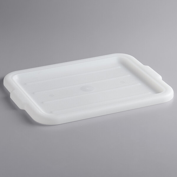 A white high density polyethylene lid for a Vollrath bus tub.