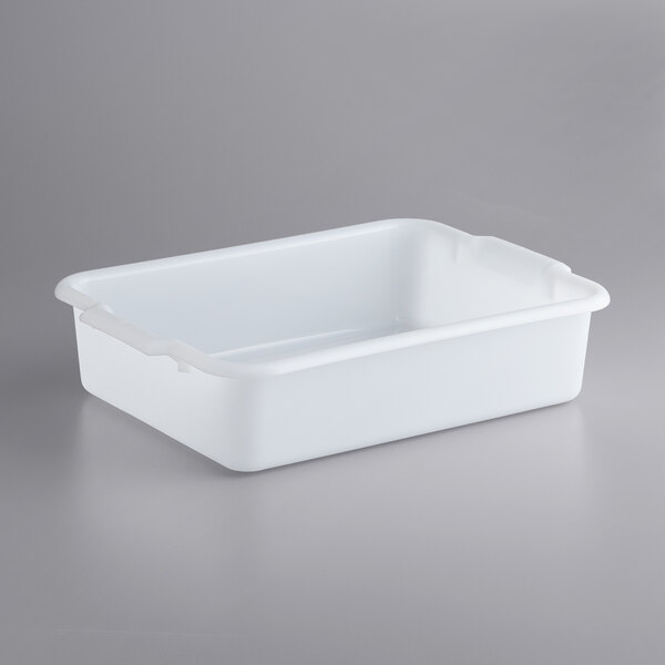 A white plastic Vollrath bus tub with a handle.