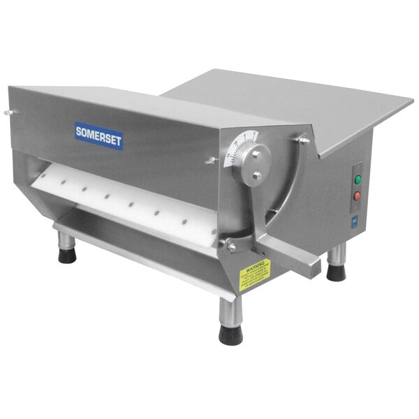 A Somerset dough roller sheeter with a white label and horizontal rollers.