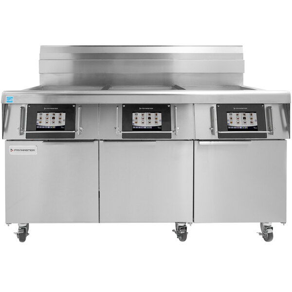 A Frymaster FilterQuick electric floor fryer with three 60 lb. frypots.