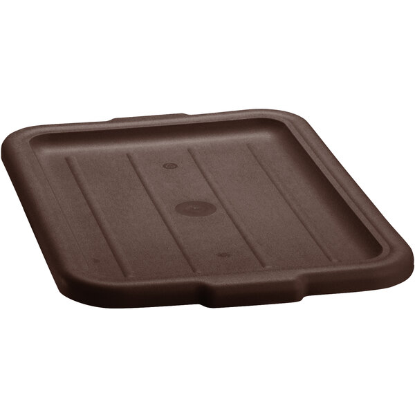 A brown high density polyethylene lid on a brown tray.