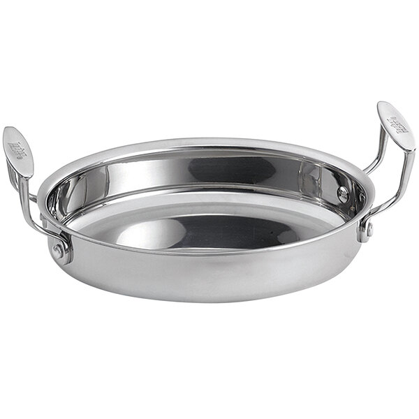 A Tablecraft stainless steel oval casserole dish with handles.