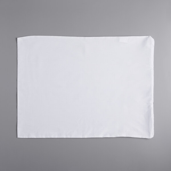 A white Oxford Standard Size Waterproof Zippered Pillow Protector on a gray surface.