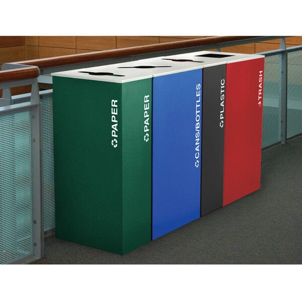 A row of black Ex-Cell Kaiser Kaleidoscope rectangular plastic recycle bins with white text.
