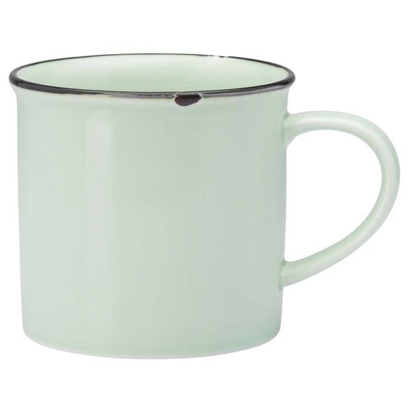 A white porcelain mug with a mint green interior and a silver rim with a close up of the handle.